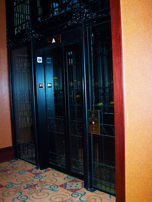 Wrought iron glass elevator