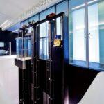 Custom Commercial Elevators - Modern glass elevator designed for a corporate building by Roys Rise